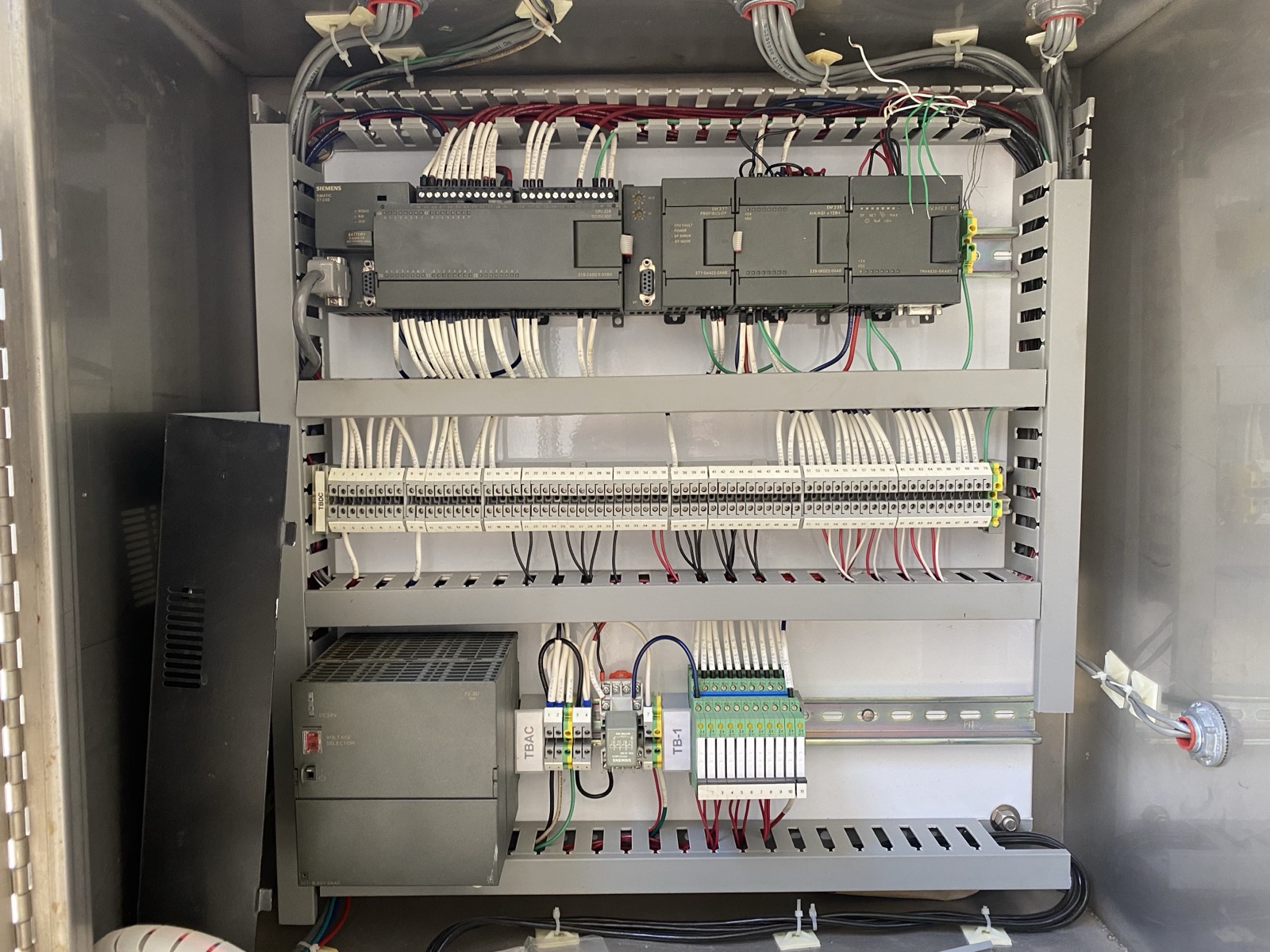Control panel with a discontinued S7-200 PLC and expansion modules